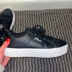 Black FILA shoes/sneakers at very good quality